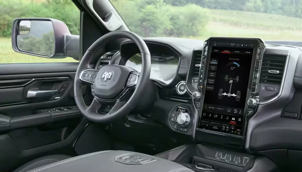 2026 RAM 1500 interior cockpit with steering wheel and large vertical touchscreen